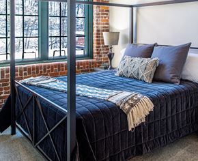 Lowell apartment for rent - a bedroom with a bed and a window