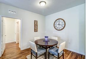 Jacksonville apartment for rent - A dining room with a table set for four.