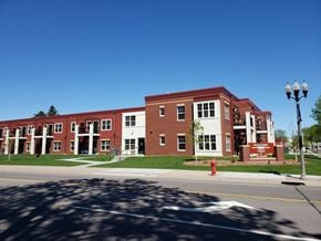 Cambridge apartment for rent - a large brick building on the corner of a street