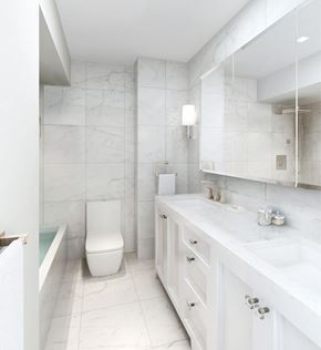 New York apartment for rent - a white bathroom with a toilet and a sink
