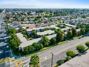 Bellflower apartment for rent - an aerial view of a neighborhood of houses on a city street
