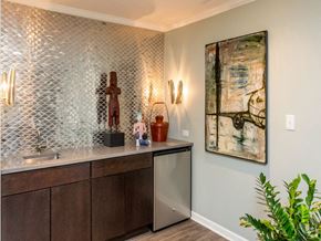 Indianapolis apartment for rent - a kitchen with a counter and a painting on the wall