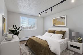 Denver apartment for rent - rendering of a bedroom with a bed and a window