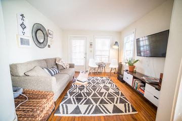 Kansas City apartment for rent - a living room with a couch and a tv