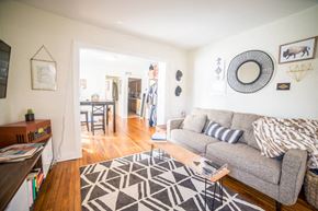 Kansas City apartment for rent - a living room with a couch and a rug