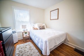 Kansas City apartment for rent - a bedroom with a bed and a tv