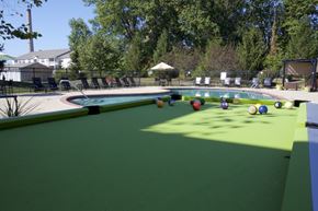 Avon Lake apartment for rent - a pool table with balls on it next to a swimming pool