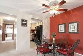 Brook Park apartment for rent - a dining room with a table and chairs and a ceiling fan