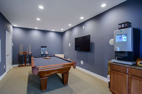 Westerville apartment for rent - A pool table in a room with a television and a cabinet.