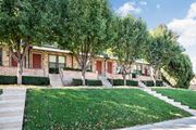 Kansas City townhouse for rent - a row of houses with trees in front of them