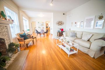 Kansas City apartment for rent - a living room with a couch and a table