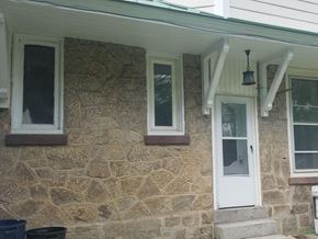 Philadelphia apartment for rent - a stone house with a white door and windows