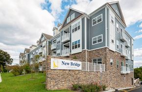 River Edge apartment for rent - a new building with a sign in front of it