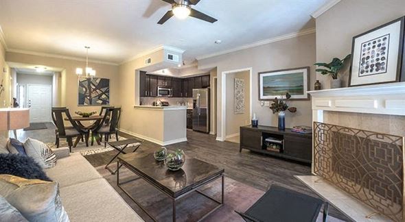 Mckinney apartment for rent - a living room with a couch and a table