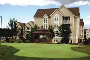Frederick apartment for rent - a large yard with a gazebo in front of a house