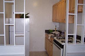 Washington apartment for rent - a kitchen with a stove and a refrigerator