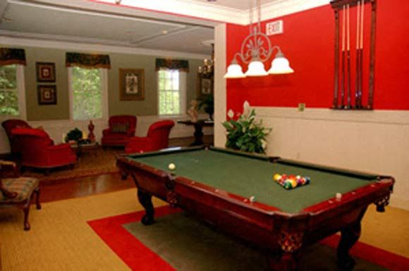 Frederick apartment for rent - a pool table in the living room of a house