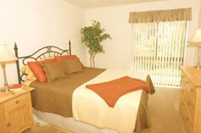 Frederick apartment for rent - a bedroom with a bed and a window