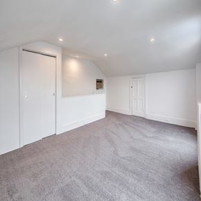 Philadelphia house for rent - A room with white walls and grey carpet.