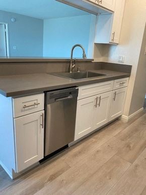 Glendale apartment for rent - a kitchen with white cabinets and a sink