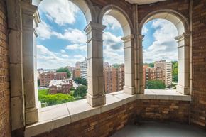 Kansas City apartment for rent - a view of the city from the balcony of a building with columns