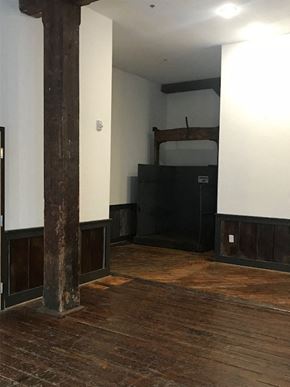 Danville apartment for rent - an empty room with a wooden floor and pillars