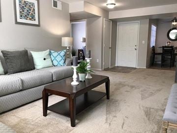 Sparks apartment for rent - a living room with a couch and a coffee table