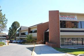 Westminster apartment for rent - A building with a sign that says Sheridan Park on it.