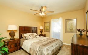 Pasadena apartment for rent - a bedroom with a bed and a ceiling fan