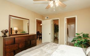 Pasadena apartment for rent - a bedroom with a large bed and a ceiling fan