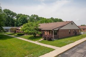 New Lebanon apartment for rent - a home in a neighborhood with a sidewalk and grass