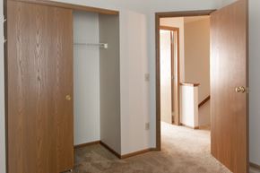 Lima apartment for rent - a bedroom with a closet and a door to a bathroom