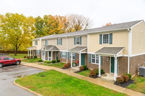 Ashland apartment for rent - a home with a red car parked in front of it