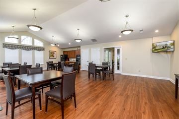 Ashland apartment for rent - a dining room with a table and chairs and a kitchen