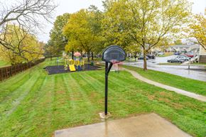 Ashland apartment for rent - a mailbox in the middle of a park with a playground