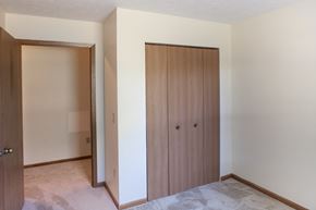 Holland apartment for rent - a bedroom with a closet and a door to a bathroom