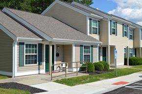 Columbus apartment for rent - the exterior of a building with a ramp and a porch