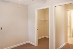 Delaware apartment for rent - an empty bedroom with a closet and a mirrored closet door