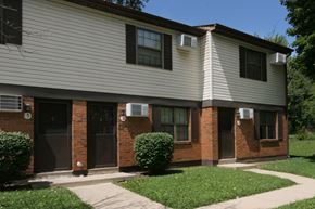 Kenton apartment for rent - a brick and with a sidewalk and grass