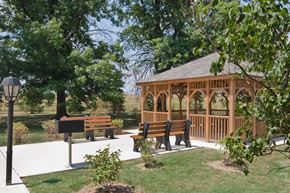 Greensburg apartment for rent - a gazebo with benches and trees in a park