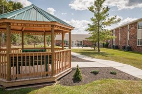 Delaware apartment for rent - a gazebo with a sidewalk in front of a building