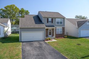 Columbus apartment for rent - a house with a driveway and a garage door