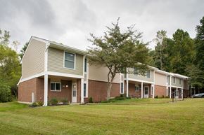 Middletown apartment for rent - a row of houses with a yard in front of them