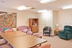 Cincinnati apartment for rent - a meeting room with a table and chairs