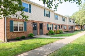 Batavia apartment for rent - a brick apartment building with a sidewalk in front of it