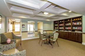 Whitehall apartment for rent - a dining room with a table and chairs and a bookshelf