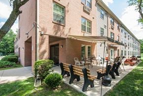 Xenia apartment for rent - our apartments have a spacious patio with tables and chairs