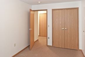 Cincinnati apartment for rent - a bedroom with two doors and a door to a closet