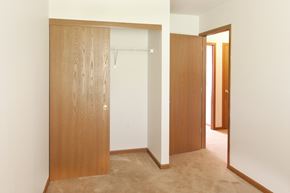 Decatur apartment for rent - a bedroom with a closet and a door to a bathroom