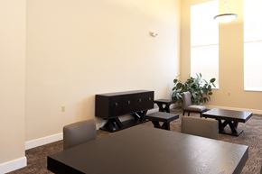 Cambridge apartment for rent - a dining room with a table and chairs and a tv